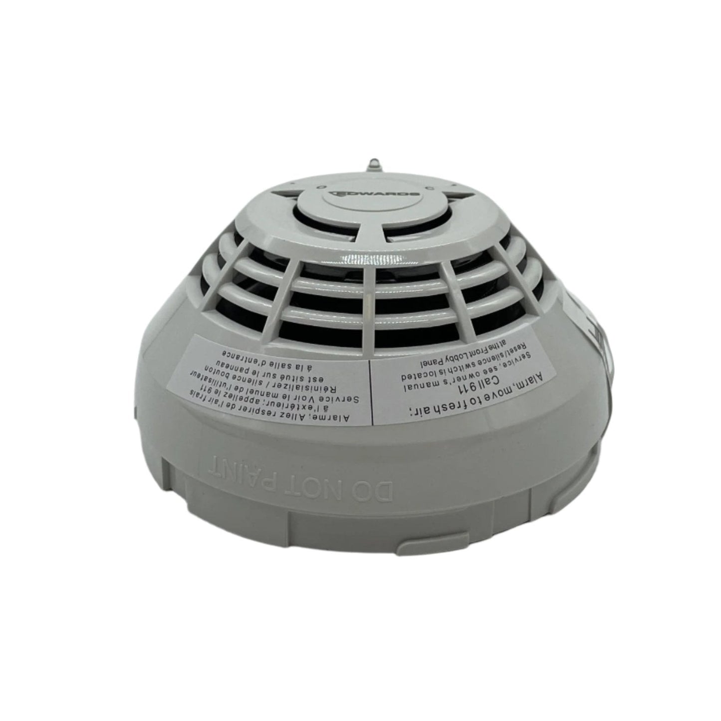 Edwards SIGA-OSCD smoke and carbon monoxide detector mounted on a ceiling, safety device by Edwards for home or office use.