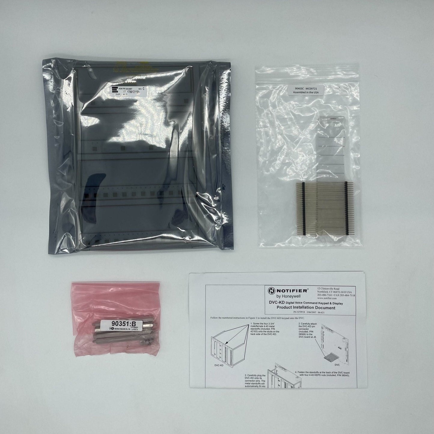 Notifier DVC-KD Digital Voice Command Key Display for fire alarm voice systems, showing keypad and digital interface in use