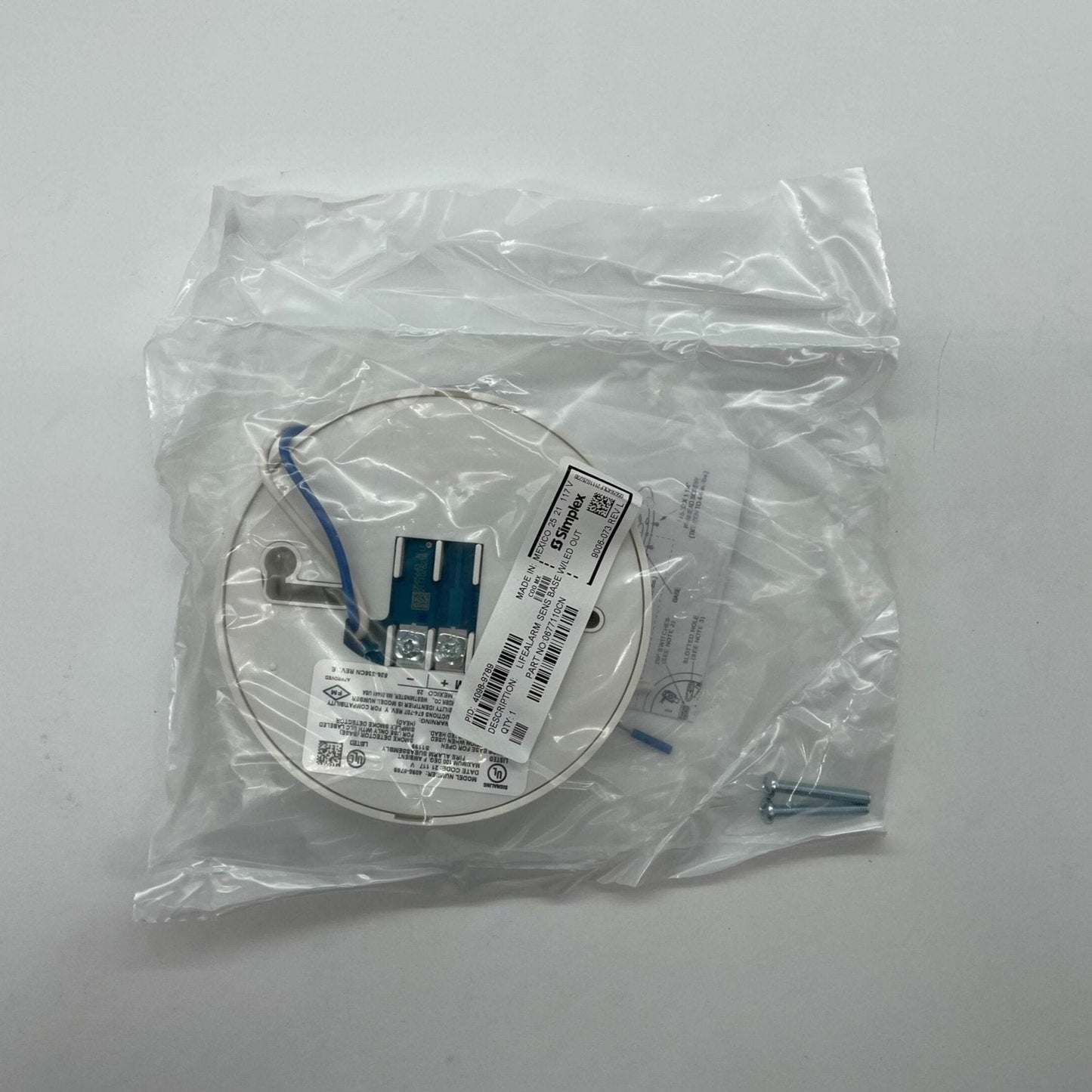 Simplex 4098-9789 fire alarm sensor base, compatible with Simplex fire alarm systems, shown in a close-up image.