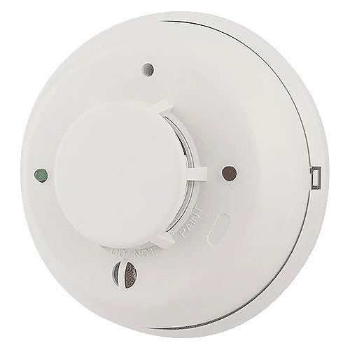 System Sensor 4WTAR-B Photoelectric Smoke Detector from i3 Series, mounted on ceiling, with electronic components visible.