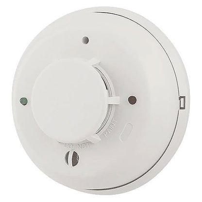 System Sensor 4WTAR-B Photoelectric Smoke Detector from i3 Series, mounted on ceiling, with electronic components visible.