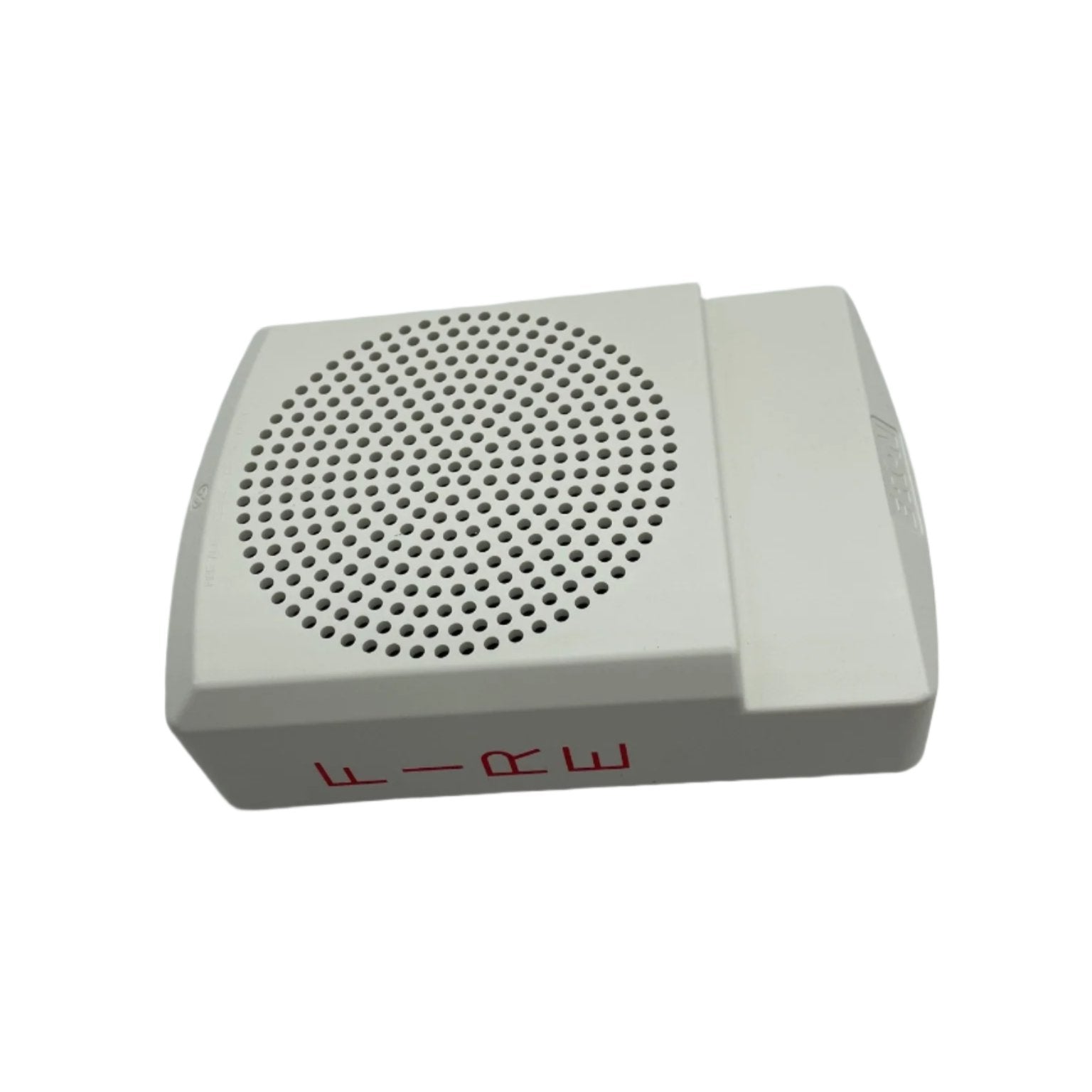 Eaton Wheelock ELSPKW fire alarm speaker, high-fidelity speaker mounted on a wall for emergency alert sound.