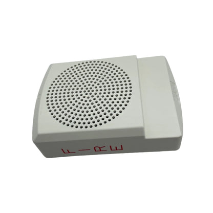 Eaton Wheelock ELSPKW fire alarm speaker, high-fidelity speaker mounted on a wall for emergency alert sound.