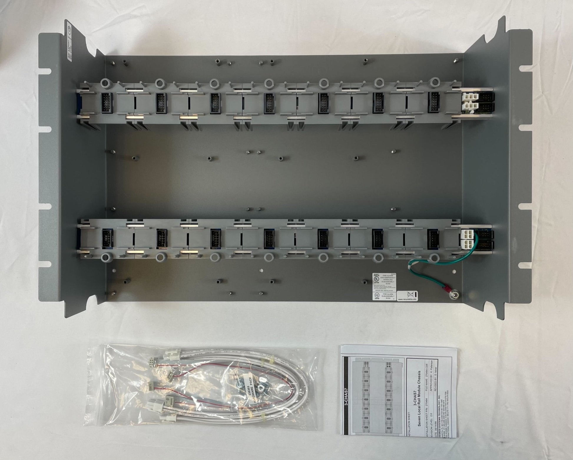Edwards 3-CHAS7 fire alarm chassis assembly with circuit board and components, used for Edwards fire alarm systems.