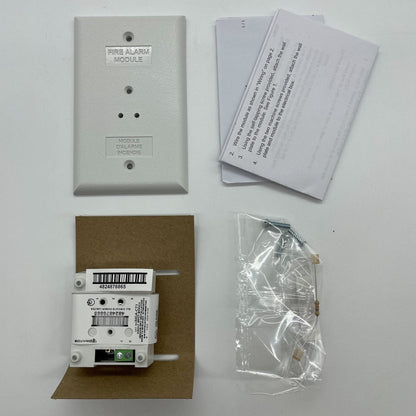 Edwards SIGA-CT1 fire alarm module with single input connection, mounted on a white background.