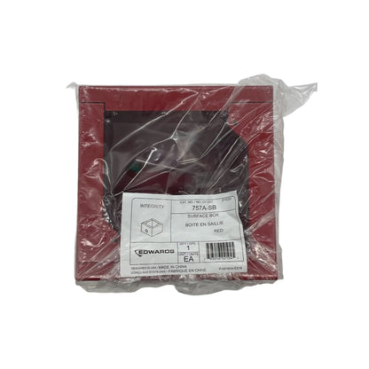 Edwards 757A-SB fire alarm surface box, mounted on wall with visible mounting hardware and label, for Edwards fire alarm system.