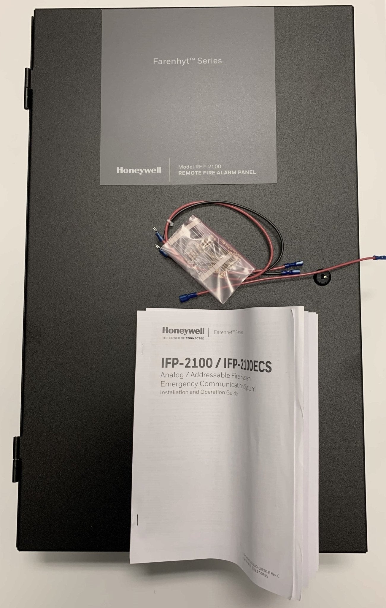 Farenhyt RFP-2100B intelligent fire alarm control panel in black with digital display and control buttons.