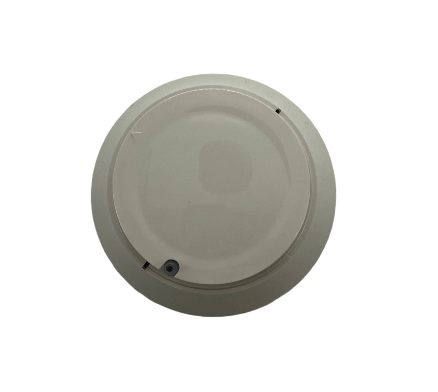 Farenhyt IDP-FIRE-CO-IV fire and carbon monoxide detector mounted on wall, black rectangular device with indicator lights.