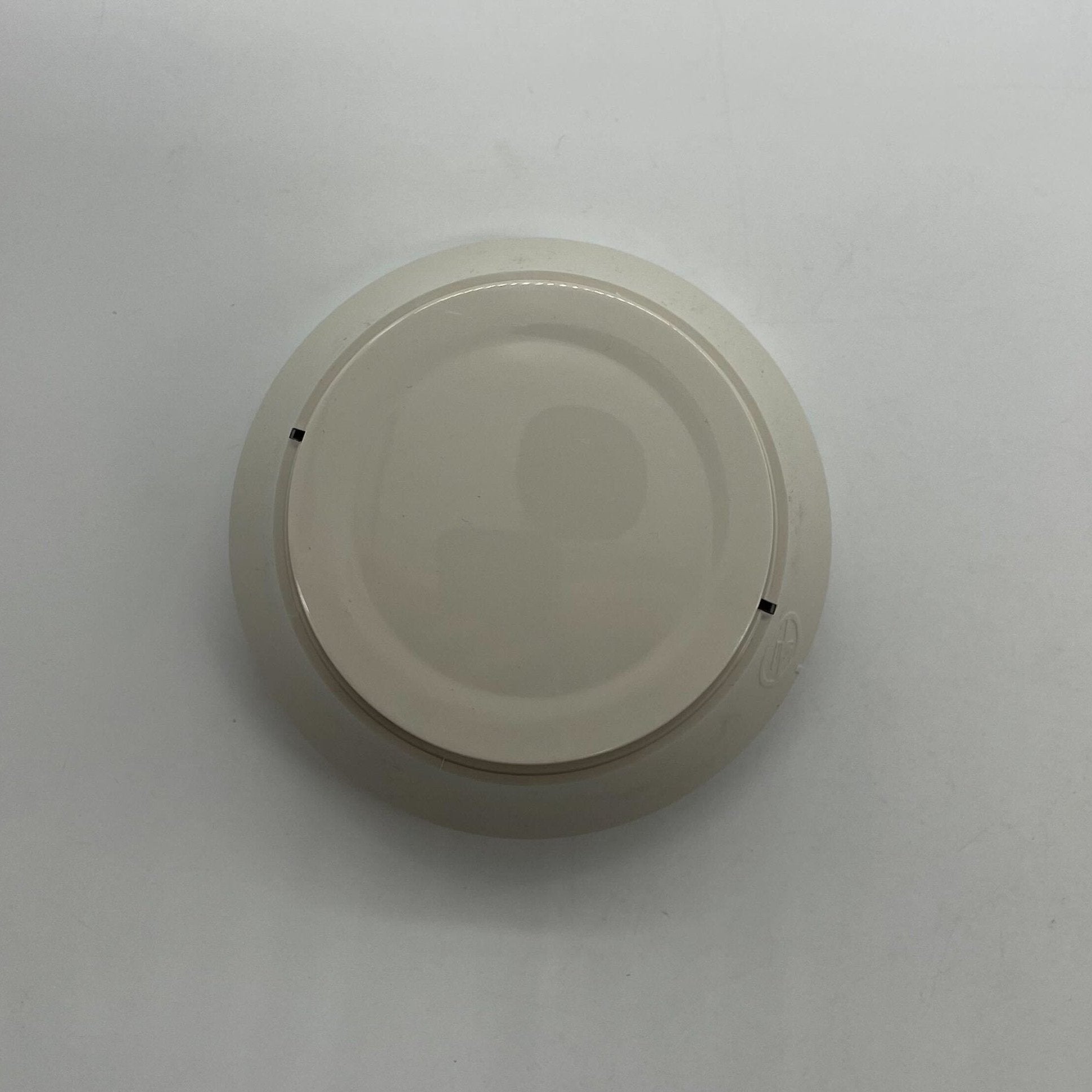 Farenhyt IDP-PHOTO-T-IV photoelectric smoke detector in ivory, close-up view showing sensor and design