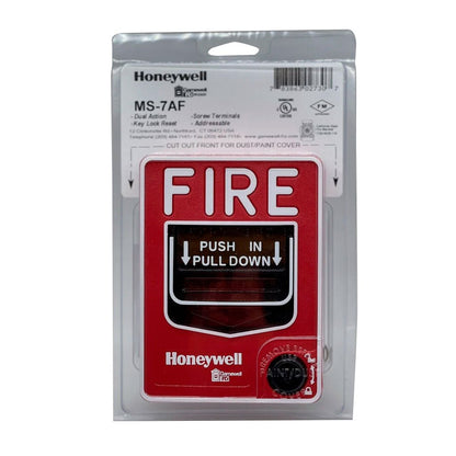 Gamewell-FCI MS-7AF fire alarm pull station, double-action fire alarm station with red plastic cover and emergency label.