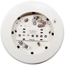 Edwards EC2-RB4 fire alarm device mounted on wall, showing its front panel and safety indicator lights.