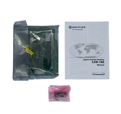 Notifier LCD-160 fire alarm annunciator with remote control, featuring a digital display for monitoring fire alarm status.