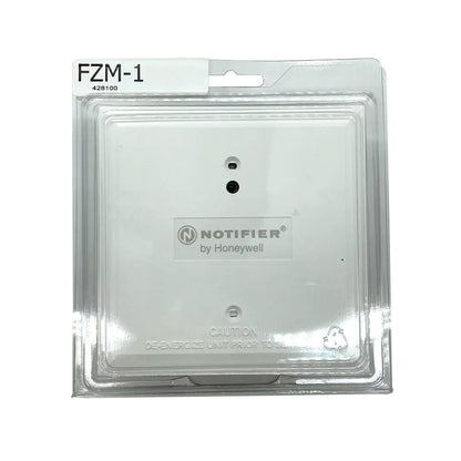 Notifier FZM-1 fire alarm interface module mounted on a control panel, showing connection ports and status indicators.