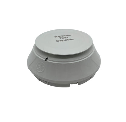 Notifier FSP-951R photoelectric smoke detector with red casing, fire alarm sensor, remote test capability, designed for fire safety.