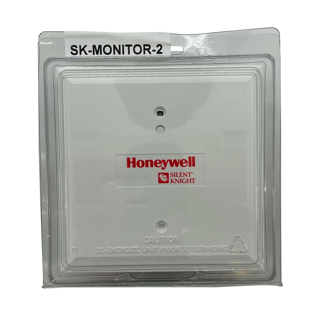 Silent Knight SK-MONITOR-2 fire alarm monitor module mounted on a panel, showcasing its interface and connection ports.