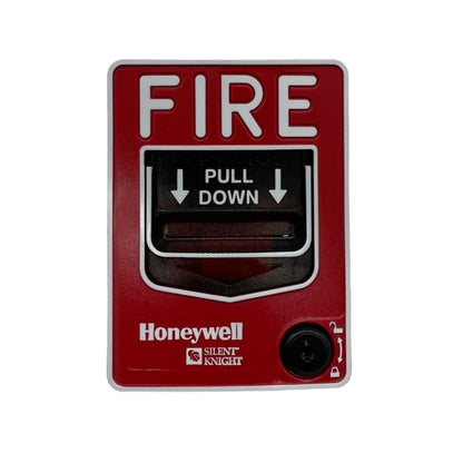 Silent Knight PS-SA fire alarm pull station with single-action design, mounted on a wall for emergency fire alerts.