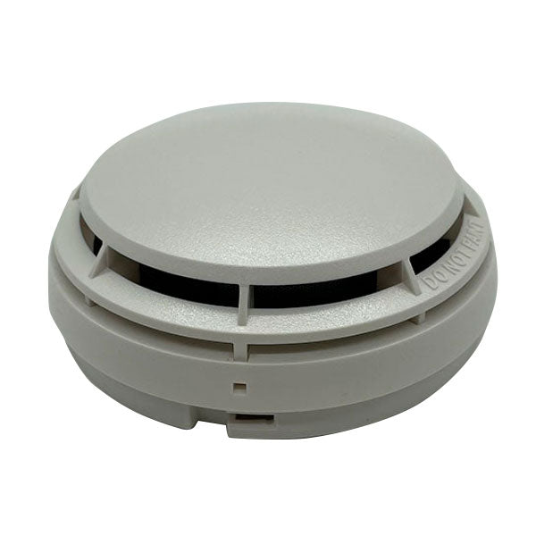 White Simplex 4098-9714 smoke detector, photoelectric fire alarm sensor with a round design for residential safety.