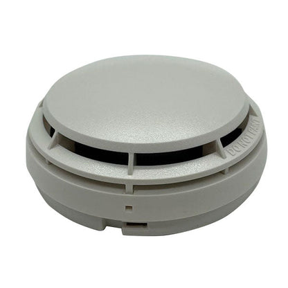 White Simplex 4098-9714 smoke detector, photoelectric fire alarm sensor with a round design for residential safety.