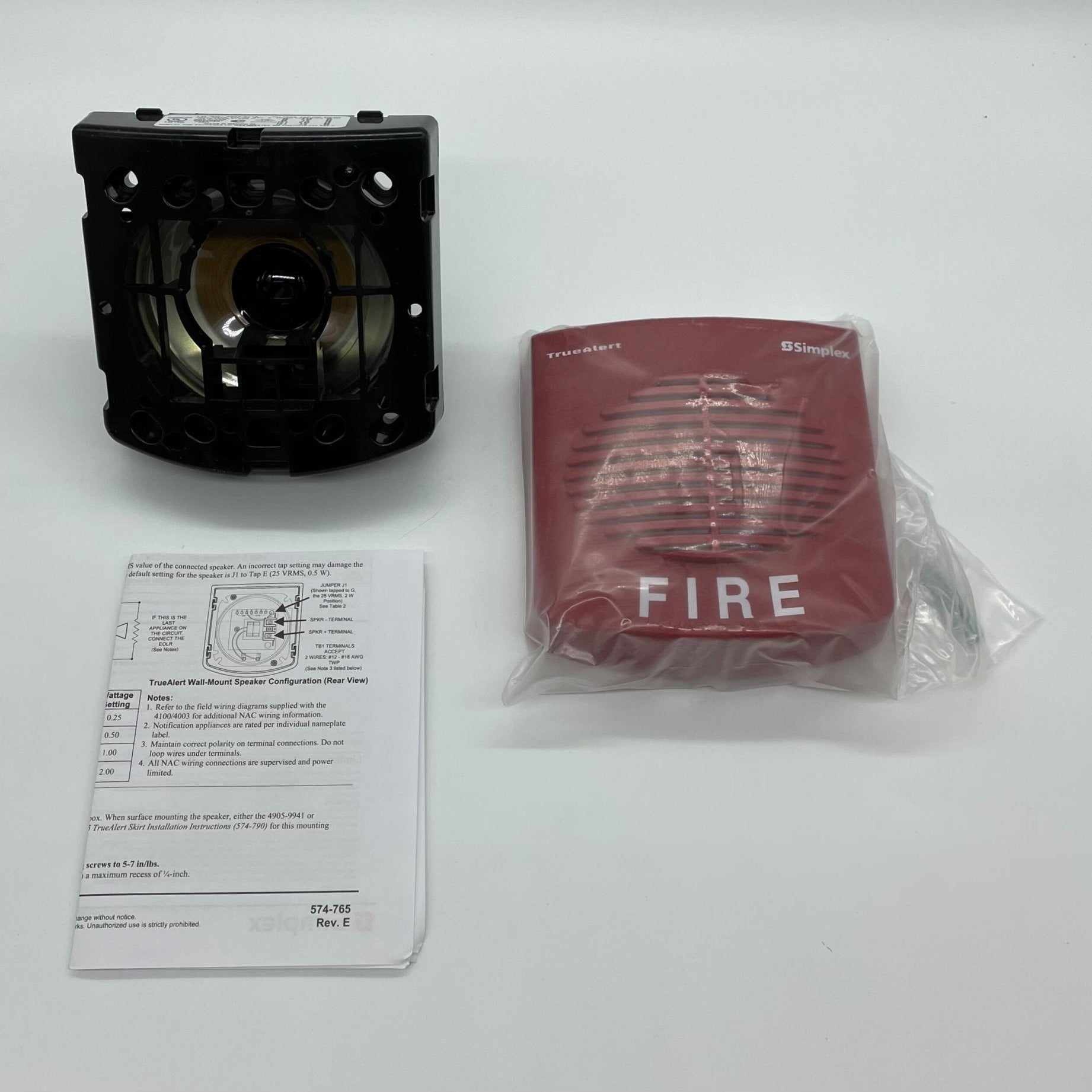 Simplex 4902-9716 fire alarm speaker mounted on wall, part of the Simplex TrueAlert fire alarm system.