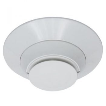 System Sensor 2351B photoelectric smoke detector for fire alarms, mounted on ceiling, with a white plastic casing and test button