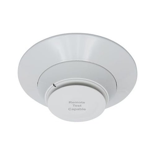 System Sensor SS-PHOTO-R photoelectric smoke detector with remote test capability, mounted on a ceiling for fire detection.