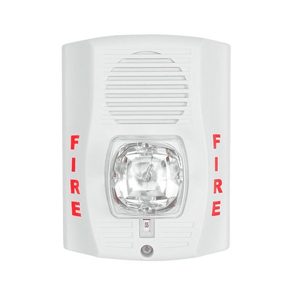 System Sensor P2WH-LF fire alarm sounder strobe with low-frequency alarm, mounted on wall, for fire safety notification.