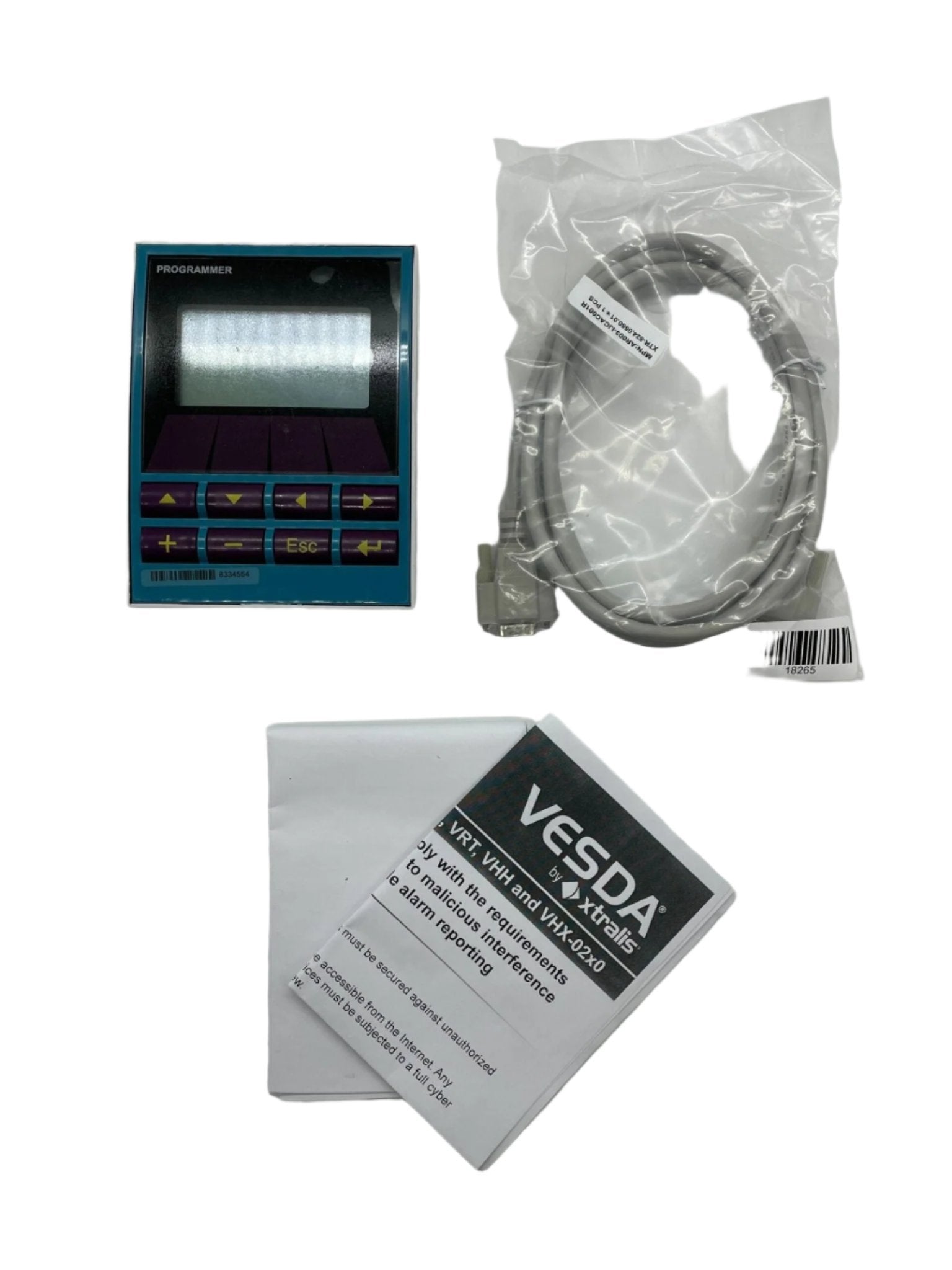 Vesda VHH-100 fire alarm programmer module from Xtralis, showing interface and connection ports on the device.